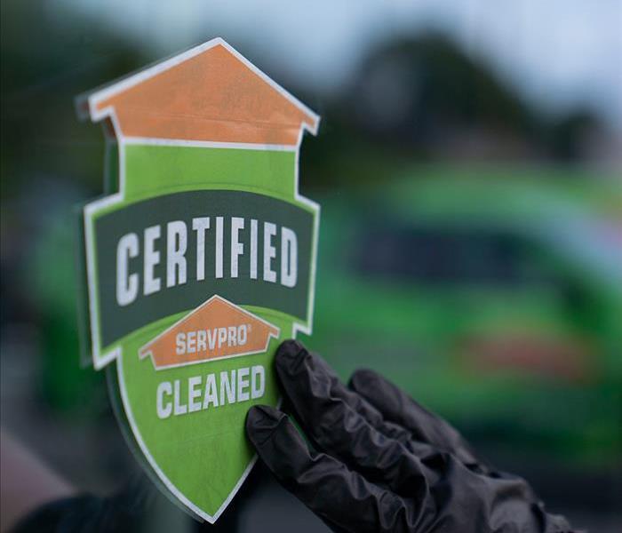 Certified: SERVPRO® Cleaned sign on window